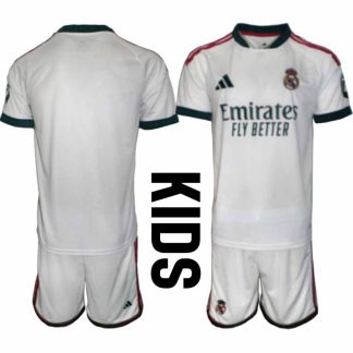 Kupiti-Prodajo-Otroski-nogometni-dresi-kompleti-Real-Madrid-Domaci-2026-27-z-lastnim-tiskom